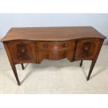 Serpentine-fronted sideboard with fluted legs, two cupboards and two drawers, approx 136cm x 49cm