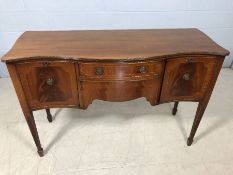 Serpentine-fronted sideboard with fluted legs, two cupboards and two drawers, approx 136cm x 49cm