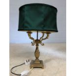Brass table lamp with four branches and green shade, overall height approx 55cm