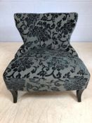 Contemporary low upholstered occasional chair