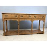 Antique pine buffet / sideboard with three drawers, brass handles and shelf to base approx 186cm x