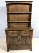 Dark wood dresser with linen fold design, approx 92cm x 42cm x 166cm tall