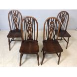 Set of four wheel-back 'Old Charm' chairs