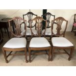 Set of five shield back dining chairs with upholstered seats and wheatsheaf design, to include two