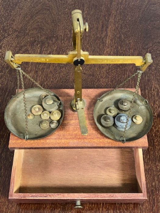 Set of Class B brass weighing scales on wooden box, with various weights - Image 2 of 4