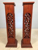 Pair of modern tall wooden carved lamps, approx 97cm tall