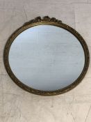 Round gilt framed mirror, approx diameter 54cm with floral design