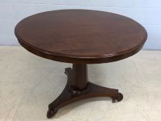 Circular mahogany breakfast table on pedestal base approx 102cm in diameter