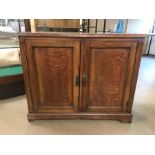 Two door oak cabinet with shelves, approx 92cm x 39cm x 74cm tall