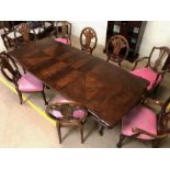 Large extendable dining room table, approx 180cm x 112cm (unextended) with eight shield back