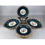 Collection of Old Worcester Parrot to include two oval serving dishes and eleven plates