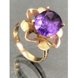 14k Gold ring with Petals and four claw mount for a faceted Amethyst approx 11mm in length