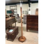 Turned light oak standard lamp