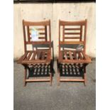 Pair of teak folding chairs