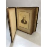 Victorian leather bound photo album with approx 43 prints, all with names