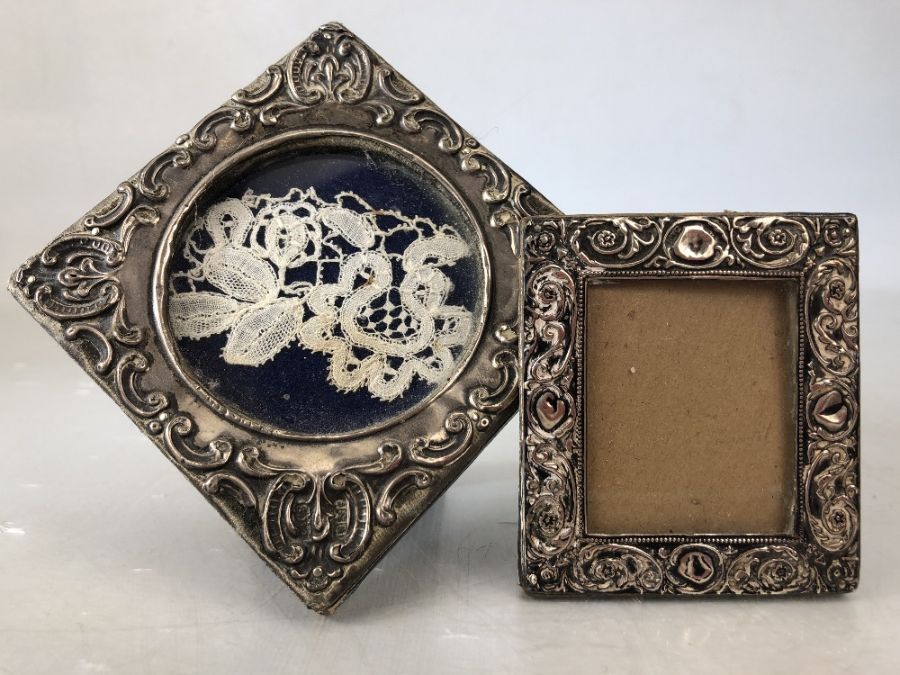 Two silver hallmarked photoframes the larger approx 9cm square both A/F