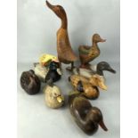 Collection of decorative carved wooden ducks, nine in total, the tallest approx 40cm in height