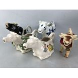 Collection of five pottery cow creamers to include 2 X Crown Devon