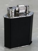 Black and chrome cigarette lighter by McMurdo