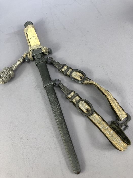 A GERMAN ARMY OFFICER`S DAGGER, c.1940, with 9 3/4" inscribed "TIGER SOLINGEN", cross guard with