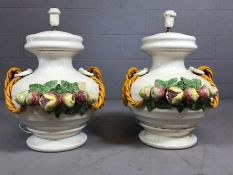 Pair of extra large majolica lamp bases decorated with pears, apples and pomegranates, approx 50cm