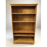 Teak style book case with three adjustable shelves, approx 80cm x 32cm x 140cm