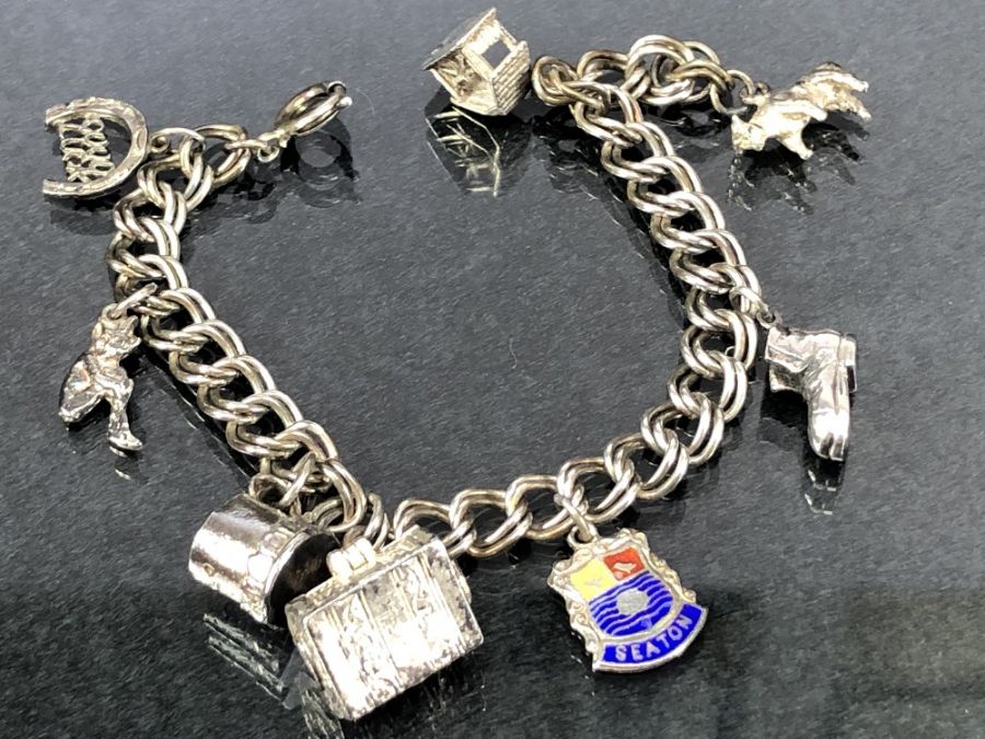 Collection of four silver and silver coloured metal bracelets some with silver coins and charms - Image 6 of 6