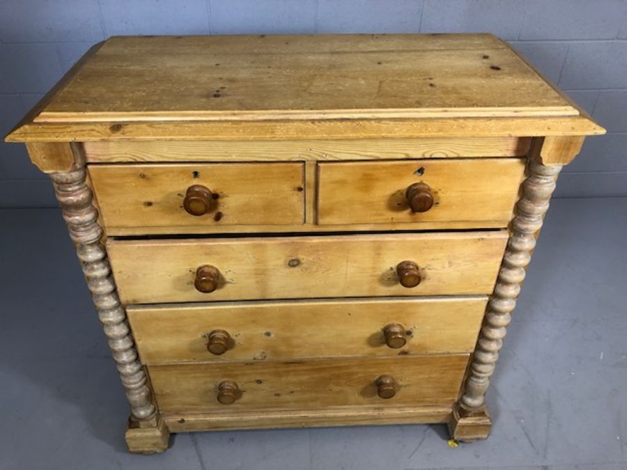 Pine chest of five drawers with turned columns to side on bun feet, approx 57cm x 115cm x 112cm - Image 2 of 5