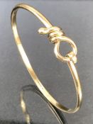 9ct Gold bangle in presentation box approx 14.2g