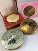 Collection of compacts to include a Boxed Revlon and a KIGU gold plated compact with map of