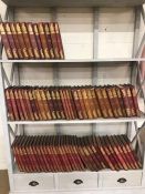 Large collection of early 20th Century cloth bound Punch magazines, approx 75 volumes