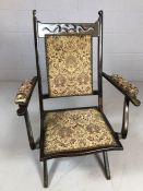 Stained wood Campaign style folding chair with tapestry upholstery (A/F)