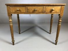 Stained antique pine hall table with three drawers on turned legs, approx 89cm x 49cm x 74cm tall