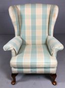 Parker Knoll wingback armchair in duck egg blue tartan upholstery