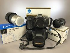 Minolta Dynax 8000i camera body, 35-80 zoom lens F/4-5.6, 75-300 zoom lens F/4.5-5.6, with case