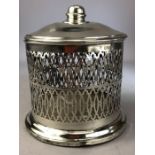 Silver hallmarked pierced pot with lid Chester hallmarks on wooden base approx 15cm tall and total