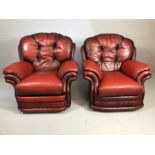 Pair of red leather armchairs (one recliner) by THOMAS LLOYD