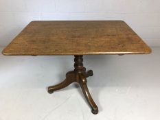 Tilt top pedestal table, approx 100cm x 70cm x 71cm tall