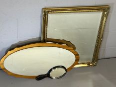 Three Mirrors, two wall mirrors and a hand held mirror