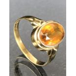 8ct Gold ring set with a faceted oval Citrine approx 'O'