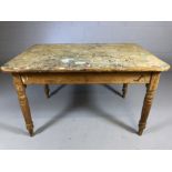 Rustic plank topped pine table on turned legs with paint splatters to top, approx 124cm x 85cm x