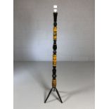 Retro turned wooden and lacquered lamp stand depicting antelopes on tripod feet