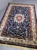 Blue ground Kashmir rug with medallion design, approx 240cm x 160cm