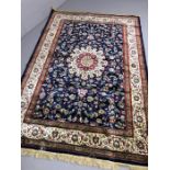 Blue ground Kashmir rug with medallion design, approx 240cm x 160cm