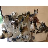 Very large collection of ceramic dogs and cats in varying sizes