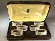 Boxed set of six silver hallmarked napkin rings in presentation case