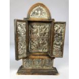 Wooden shrine or votive with silver panels depicting the stations of the cross 12 panels in total
