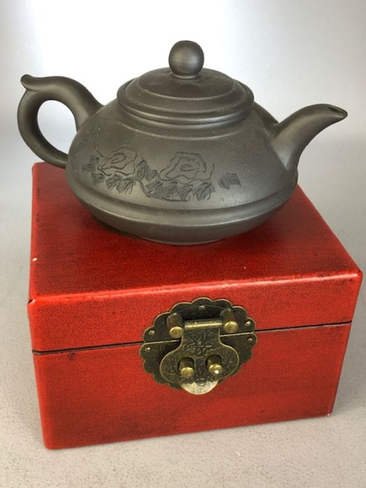 Boxed Yixing Chinese teapot with impressed character marks to base