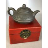 Boxed Yixing Chinese teapot with impressed character marks to base