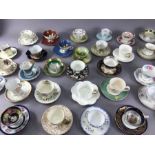 Large collection of porcelain cabinet cups and saucers to include examples by Doulton, Coalport,